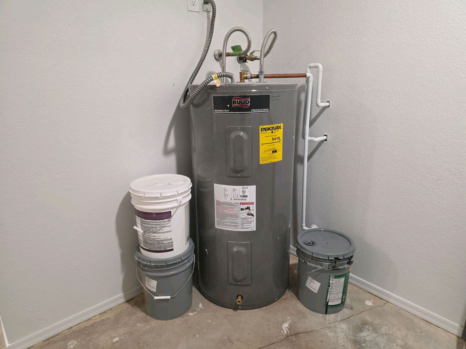Electric water heater with no expansion tank or drip pan